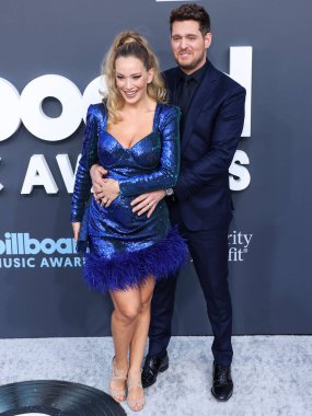 Michael Bubl (Michael Buble) ve Luisana Lopilato, 15 Mayıs 2022 'de MGM Grand Garden Arena' da düzenlenen 2022 Billboard Müzik Ödülleri 'ne geldiler.. 