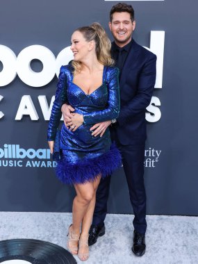 Michael Bubl (Michael Buble) ve Luisana Lopilato, 15 Mayıs 2022 'de MGM Grand Garden Arena' da düzenlenen 2022 Billboard Müzik Ödülleri 'ne geldiler.. 