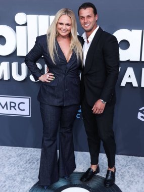 Amerikalı şarkıcı ve söz yazarı Miranda Lambert ve kocası Brendan McLoughlin, 15 Mayıs 2022 'de MGM Grand Garden Arena' da düzenlenen 2022 Billboard Müzik Ödülleri 'ne geldiler..