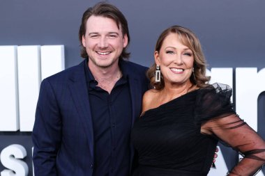 American singer Morgan Wallen and mother Lesli Wallen arrive at the 2022 Billboard Music Awards held at the MGM Grand Garden Arena on May 15, 2022 in Las Vegas, Nevada, United States. 