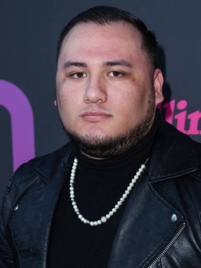 Koji, 12 Mayıs 2022 'de Beverly Hills, Los Angeles, Kaliforniya, ABD' deki Hearst Estate 'te düzenlenen Rolling Stone ve Meta Açılış Yaratıcıları Sayısı Kutlaması' na ulaşır..