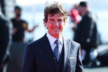 Amerikalı aktör Tom Cruise, Paramount Pictures 'ın Top Gun: Maverick filminin dünya prömiyerine 4 Mayıs 2022' de ABD 'nin Kaliforniya eyaletinin San Diego kentindeki USS Midway Müzesi' nde geldi.. 