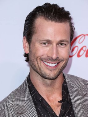 Amerikalı aktör Glen Powell, 28 Nisan 2022 tarihinde Las Vegas 'ta düzenlenen Ulusal Tiyatro Sahipleri Derneği resmi toplantısı olan Caesars Palace' daki Omnia Gece Kulübü 2022 CinemaCon Büyük Ekran Başarı Ödülleri 'ne geldi.