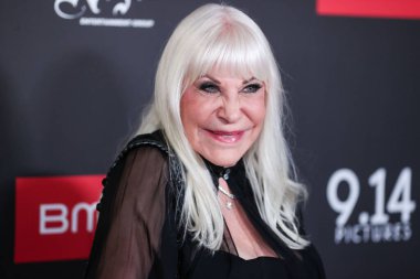 Wendy Dio (Ronnie James Dio 'nun dul eşi), 20 Eylül 2022' de Hollywood, Los Angeles, Kaliforniya, ABD 'deki TCL Çin 6 Tiyatro Kompleksi' nde düzenlenen 'DIO: Dreamers Never Die' adlı 9.14 filminin Los Angeles galasına geldi.. 