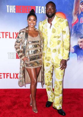 Valentino giyen Amerikalı aktris Gabrielle Union ve Gucci giyen Amerikalı eski profesyonel basketbolcu Dwyane Wade Netflix 'in 