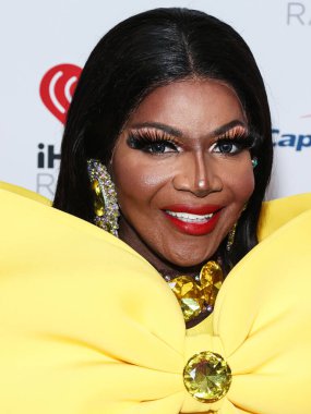Coco Montrese, 23 Eylül 2022 'de Las Vegas, Nevada' da T-Mobile Arena 'da düzenlenen iHeartRadio Music Festival' de basın odasında poz verdi..