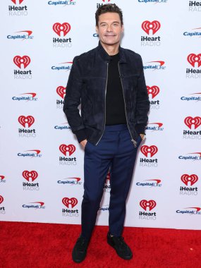 Ryan Seacrest, 23 Eylül 2022 'de Las Vegas, Nevada' da T-Mobile Arena 'da düzenlenen iHeartRadio Music Festival' de basın odasında poz verdi.. 