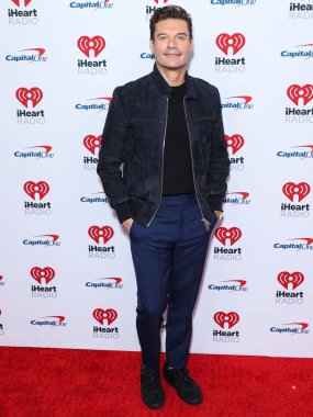 Ryan Seacrest, 23 Eylül 2022 'de Las Vegas, Nevada' da T-Mobile Arena 'da düzenlenen iHeartRadio Music Festival' de basın odasında poz verdi.. 