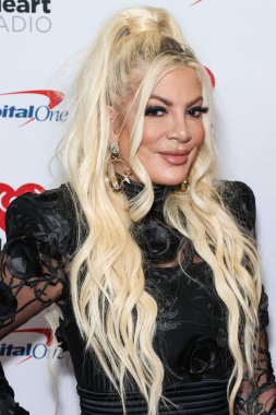 Tori Spelling, 23 Eylül 2022 'de Las Vegas, Nevada' da T-Mobile Arena 'da düzenlenen iHeartRadio Music Festival' de basın odasında poz verdi.