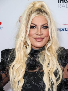 Tori Spelling, 23 Eylül 2022 'de Las Vegas, Nevada' da T-Mobile Arena 'da düzenlenen iHeartRadio Music Festival' de basın odasında poz verdi.