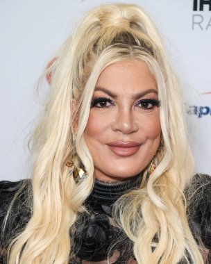 Tori Spelling, 23 Eylül 2022 'de Las Vegas, Nevada' da T-Mobile Arena 'da düzenlenen iHeartRadio Music Festival' de basın odasında poz verdi.