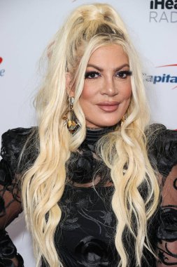 Tori Spelling, 23 Eylül 2022 'de Las Vegas, Nevada' da T-Mobile Arena 'da düzenlenen iHeartRadio Music Festival' de basın odasında poz verdi.