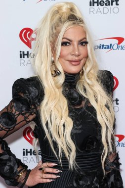 Tori Spelling, 23 Eylül 2022 'de Las Vegas, Nevada' da T-Mobile Arena 'da düzenlenen iHeartRadio Music Festival' de basın odasında poz verdi.