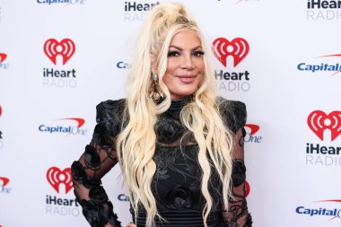 Tori Spelling, 23 Eylül 2022 'de Las Vegas, Nevada' da T-Mobile Arena 'da düzenlenen iHeartRadio Music Festival' de basın odasında poz verdi.