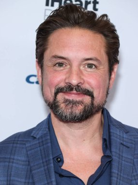 Will Friedle, 23 Eylül 2022 'de Las Vegas, Nevada' da T-Mobile Arena 'da düzenlenen iHeartRadio Music Festival' de basın odasında poz verdi.. 