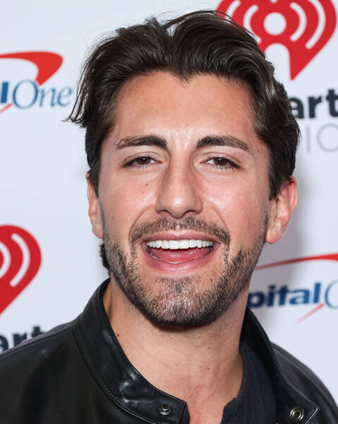 Jason Tartick poses in the press room at the 2022 iHeartRadio Music Festival - Night 1 held at the T-Mobile Arena on September 23, 2022 in Las Vegas, Nevada, United States