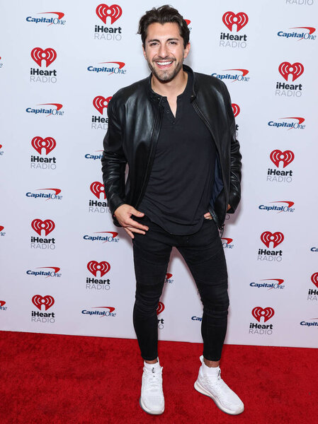Jason Tartick poses in the press room at the 2022 iHeartRadio Music Festival - Night 1 held at the T-Mobile Arena on September 23, 2022 in Las Vegas, Nevada, United States. 
