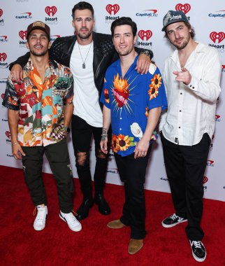 Carlos PenaVega, James Maslow, Logan Henderson ve Kendall Schmidt, 24 Eylül 2022 'de Las Vegas, Nevada, ABD' de bulunan T-Mobil Arena 'da düzenlenen 2022 iHeartRadio Music Festival' de basın odasında poz verdiler.. 
