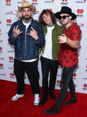 Aldatma Kodları 'ndan KEVI, Trevor Dahl ve Matthew Russell, 24 Eylül 2022' de Las Vegas, Nevada, ABD 'de T-Mobil Arena' da düzenlenen iHeartRadio Music Festival 'de basın odasında poz verdiler.. 