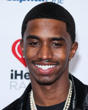 King Combs (Christian Casey Combs), 24 Eylül 2022 'de Las Vegas, Nevada' da T-Mobile Arena 'da düzenlenen iHeartRadio Music Festival' de basın odasında poz verdi.. 