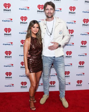 Maren Morris and husband Ryan Hurd pose in the press room at the 2022 iHeartRadio Music Festival - Night 2 held at the T-Mobile Arena on September 24, 2022 in Las Vegas, Nevada, United States. 