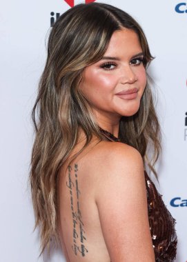 Maren Morris, 24 Eylül 2022 'de Las Vegas, Nevada' da T-Mobile Arena 'da düzenlenen iHeartRadio Music Festival' de basın odasında poz verdi.
