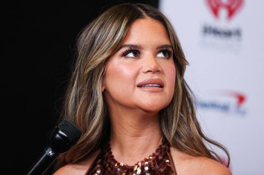 Maren Morris, 24 Eylül 2022 'de Las Vegas, Nevada' da T-Mobile Arena 'da düzenlenen iHeartRadio Music Festival' de basın odasında poz verdi.