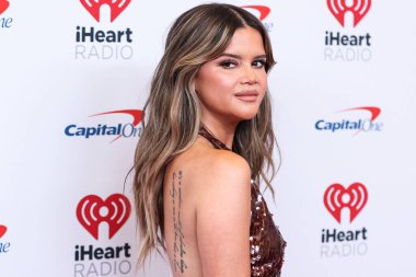 Maren Morris, 24 Eylül 2022 'de Las Vegas, Nevada' da T-Mobile Arena 'da düzenlenen iHeartRadio Music Festival' de basın odasında poz verdi.