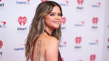 Maren Morris, 24 Eylül 2022 'de Las Vegas, Nevada' da T-Mobile Arena 'da düzenlenen iHeartRadio Music Festival' de basın odasında poz verdi.