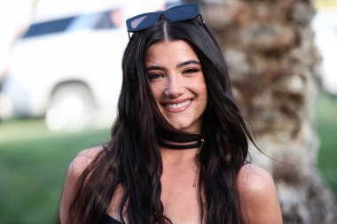 Amerikalı dansçı Charli D 'Amelio, 16 Nisan 2022' de La Quinta, Riverside, Kaliforniya, ABD 'de düzenlenen Merv Griffin Estate' te düzenlenen H.wood Group REVOLVE FESTIVAL 2022 'ye katıldı..