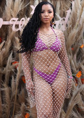 Amerikalı şarkıcı ve söz yazarı Chloe Bailey, 16 Nisan 2022 'de La Quinta, Riverside, Kaliforniya, ABD' de düzenlenen Merv Griffin Estate 'te düzenlenen REVOLVE X H.wood Group REVOLVE FESTIVAL 2022' ye katıldı.. 