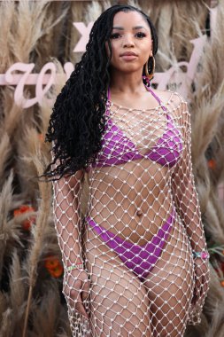 Amerikalı şarkıcı ve söz yazarı Chloe Bailey, 16 Nisan 2022 'de La Quinta, Riverside, Kaliforniya, ABD' de düzenlenen Merv Griffin Estate 'te düzenlenen REVOLVE X H.wood Group REVOLVE FESTIVAL 2022' ye katıldı.. 