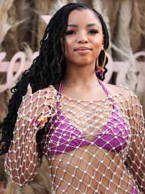 Amerikalı şarkıcı ve söz yazarı Chloe Bailey, 16 Nisan 2022 'de La Quinta, Riverside, Kaliforniya, ABD' de düzenlenen Merv Griffin Estate 'te düzenlenen REVOLVE X H.wood Group REVOLVE FESTIVAL 2022' ye katıldı.. 