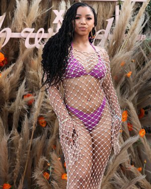 Amerikalı şarkıcı ve söz yazarı Chloe Bailey, 16 Nisan 2022 'de La Quinta, Riverside, Kaliforniya, ABD' de düzenlenen Merv Griffin Estate 'te düzenlenen REVOLVE X H.wood Group REVOLVE FESTIVAL 2022' ye katıldı.. 