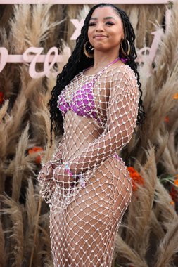 Amerikalı şarkıcı ve söz yazarı Chloe Bailey, 16 Nisan 2022 'de La Quinta, Riverside, Kaliforniya, ABD' de düzenlenen Merv Griffin Estate 'te düzenlenen REVOLVE X H.wood Group REVOLVE FESTIVAL 2022' ye katıldı.. 