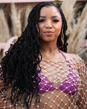 Amerikalı şarkıcı ve söz yazarı Chloe Bailey, 16 Nisan 2022 'de La Quinta, Riverside, Kaliforniya, ABD' de düzenlenen Merv Griffin Estate 'te düzenlenen REVOLVE X H.wood Group REVOLVE FESTIVAL 2022' ye katıldı.. 