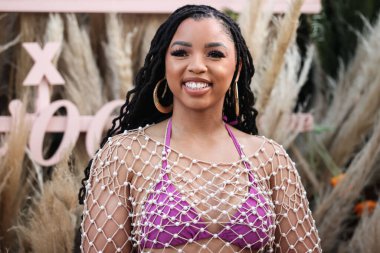 Amerikalı şarkıcı ve söz yazarı Chloe Bailey, 16 Nisan 2022 'de La Quinta, Riverside, Kaliforniya, ABD' de düzenlenen Merv Griffin Estate 'te düzenlenen REVOLVE X H.wood Group REVOLVE FESTIVAL 2022' ye katıldı.. 