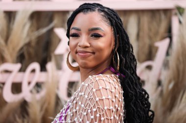 Amerikalı şarkıcı ve söz yazarı Chloe Bailey, 16 Nisan 2022 'de La Quinta, Riverside, Kaliforniya, ABD' de düzenlenen Merv Griffin Estate 'te düzenlenen REVOLVE X H.wood Group REVOLVE FESTIVAL 2022' ye katıldı.. 