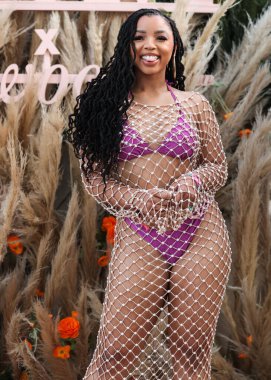 Amerikalı şarkıcı ve söz yazarı Chloe Bailey, 16 Nisan 2022 'de La Quinta, Riverside, Kaliforniya, ABD' de düzenlenen Merv Griffin Estate 'te düzenlenen REVOLVE X H.wood Group REVOLVE FESTIVAL 2022' ye katıldı.. 