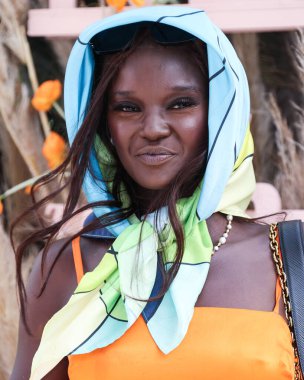 Australian model Duckie Thot attends REVOLVE x The h.wood Group Present REVOLVE FESTIVAL 2022 held at the Merv Griffin Estate on April 16, 2022 in La Quinta, Riverside, California, United States. clipart