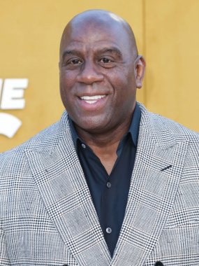 Amerikalı eski profesyonel basketbolcu Magic Johnson (Earvin Johnson Jr.), 14 Nisan 2022 'de Westwood, Los Angeles, Kaliforniya, ABD' deki Regency Village Theatre 'da düzenlenen Apple' ın 'They Call Me Magic' adlı oyununun Los Angeles galasına geldi.