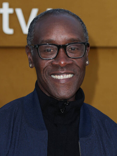Don Cheadle arrives at the Los Angeles Premiere Of Apple's 'They Call Me Magic' held at the Regency Village Theatre on April 14, 2022 in Westwood, Los Angeles, California, United States. 