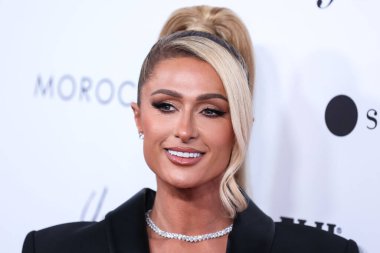 Beverly Hills, Birleşik Devletler. 10 Nisan 2022 'de. Paris Hilton, Area 'nın kıyafetlerini giyip The Daily Front Row' un 6. Geleneksel Los Angeles Moda Ödülleri 'ne geldi. Sunar: Yes Am Cacharel, Fas yağı, güneş gözlüğü kulübe, MCM, FIJI, Fısıldayan Melek.