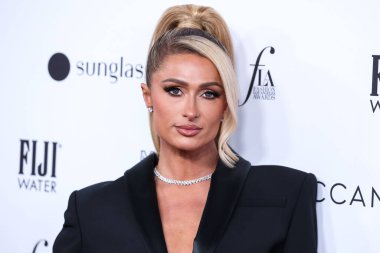 Beverly Hills, Birleşik Devletler. 10 Nisan 2022 'de. Paris Hilton, Area 'nın kıyafetlerini giyip The Daily Front Row' un 6. Geleneksel Los Angeles Moda Ödülleri 'ne geldi. Sunar: Yes Am Cacharel, Fas yağı, güneş gözlüğü kulübe, MCM, FIJI, Fısıldayan Melek.