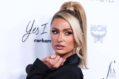 Beverly Hills, Birleşik Devletler. 10 Nisan 2022 'de. Paris Hilton, Area 'nın kıyafetlerini giyip The Daily Front Row' un 6. Geleneksel Los Angeles Moda Ödülleri 'ne geldi. Sunar: Yes Am Cacharel, Fas yağı, güneş gözlüğü kulübe, MCM, FIJI, Fısıldayan Melek.