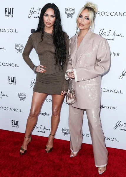 Megan Fox ve Maeve Reilly, Yes I Am Cacharel, Fas yağı, Sunglass Hut, MCM, FIJI, Whispering Angel ve Sleep Spa Hastens tarafından Beverly Wilshire 'da düzenlenen The Daily Front Row' un 6.