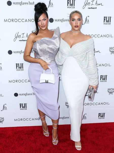Olivia Pierson ve Sophia Pierson, Yes I Am Cacharel, Fas yağı, Sunglass Hut, MCM, FIJI, Whispering Angel ve Sleep Spa Hastens tarafından Beverly Wilshire 'da düzenlenen The Daily Front Row' un 6.