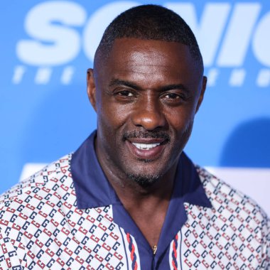 Gucci giyen İngiliz-Sierra Leonean aktör Idris Elba, 5 Nisan 2022 'de Westwood, Los Angeles, Kaliforniya, ABD' deki Regency Village Theatre 'da düzenlenen' Sonic The Kirpi 2 'nin Los Angeles Premiere gösterimine geldi.. 