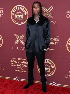 Rapçi Tyga (Micheal Ray Stevenson), 26 Mart 2022 tarihinde Bel Air, Los Angeles, Kaliforniya, ABD 'de düzenlenen Darren Dzienciol ve Richie Akiva Oscar Partisi 2022' ye geldi.. 