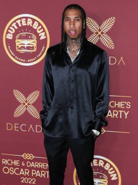 Rapçi Tyga (Micheal Ray Stevenson), 26 Mart 2022 tarihinde Bel Air, Los Angeles, Kaliforniya, ABD 'de düzenlenen Darren Dzienciol ve Richie Akiva Oscar Partisi 2022' ye geldi.. 